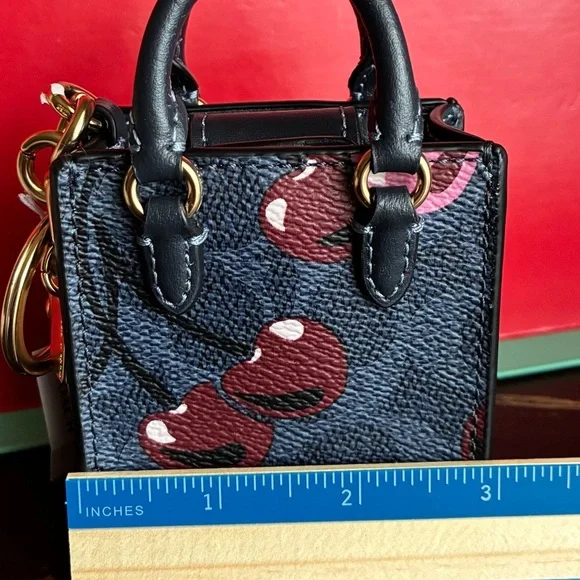 Coach Navy and Burgundy Cherry Print Key Holder - Picture 3 of 15